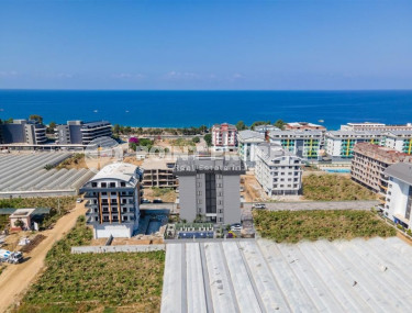 Апартаменты, 46-180м², в малоквартирном комплексе на этапе строительства в 250м от моря в районе Каргыджак-id-1235-фото-4