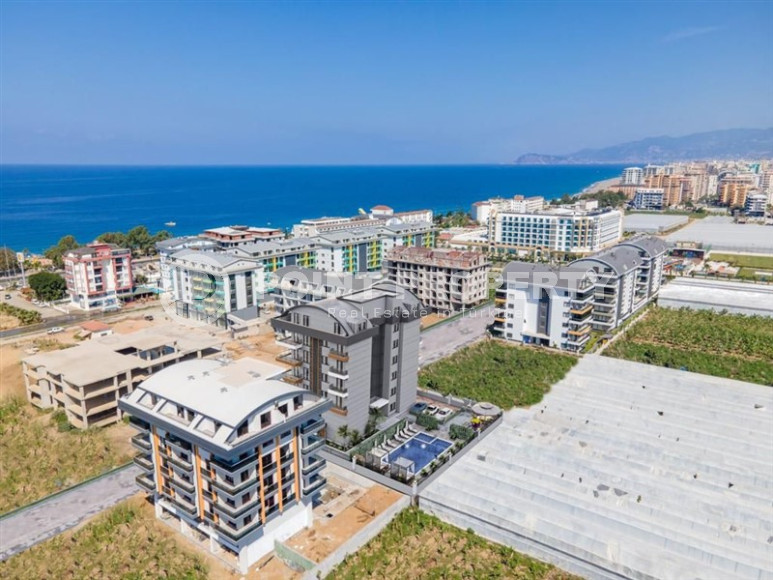 Апартаменты, 46-180м², в малоквартирном комплексе на этапе строительства в 250м от моря в районе Каргыджак-id-1235-фото-6