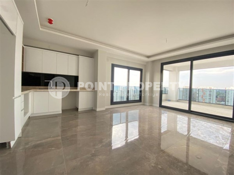 View apartment 2+1 in a new building, unfurnished, 120 m2, in the Mezitli area, Mersin-id-2682-photo-2