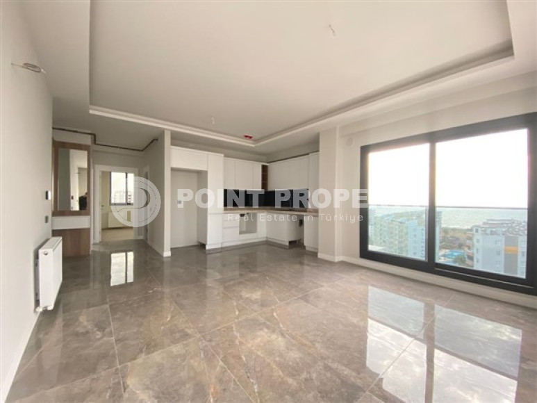 View apartment 2+1 in a new building, unfurnished, 120 m2, in the Mezitli area, Mersin-id-2682-photo-3
