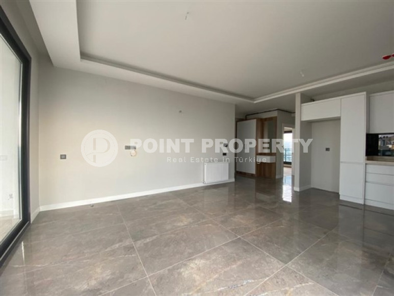 View apartment 2+1 in a new building, unfurnished, 120 m2, in the Mezitli area, Mersin-id-2682-photo-4