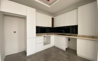 View apartment 2+1 in a new building, unfurnished, 120 m2, in the Mezitli area, Mersin-id-2682-photo-9