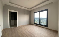 View apartment 2+1 in a new building, unfurnished, 120 m2, in the Mezitli area, Mersin-id-2682-photo-11