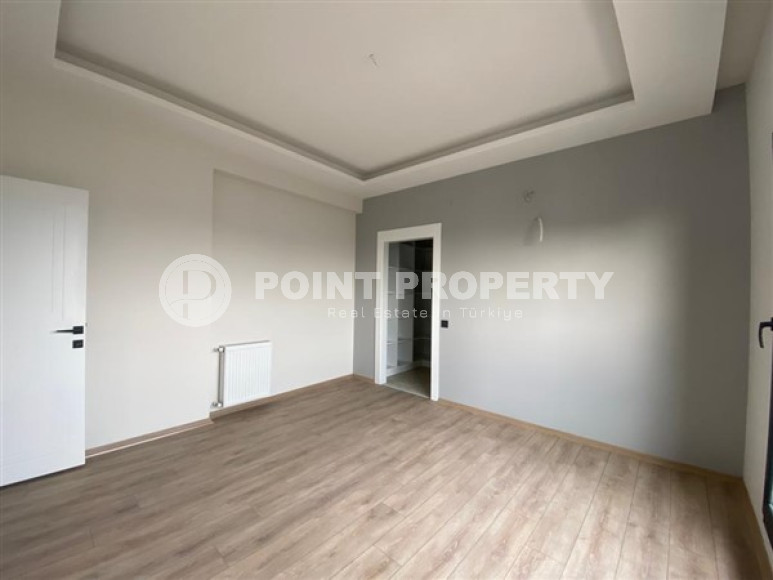 View apartment 2+1 in a new building, unfurnished, 120 m2, in the Mezitli area, Mersin-id-2682-photo-12
