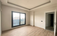 View apartment 2+1 in a new building, unfurnished, 120 m2, in the Mezitli area, Mersin-id-2682-photo-14