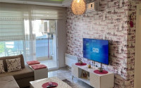 Well-maintained apartment 65 m2, 1+1, in a five-story building built in 2012 in the Oba area, Alanya-id-2686-photo-3