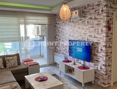 Well-maintained apartment 65 m2, 1+1, in a five-story building built in 2012 in the Oba area, Alanya-id-2686-photo-3