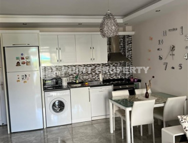 Well-maintained apartment 65 m2, 1+1, in a five-story building built in 2012 in the Oba area, Alanya-id-2686-photo-4