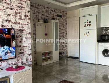 Well-maintained apartment 65 m2, 1+1, in a five-story building built in 2012 in the Oba area, Alanya-id-2686-photo-5