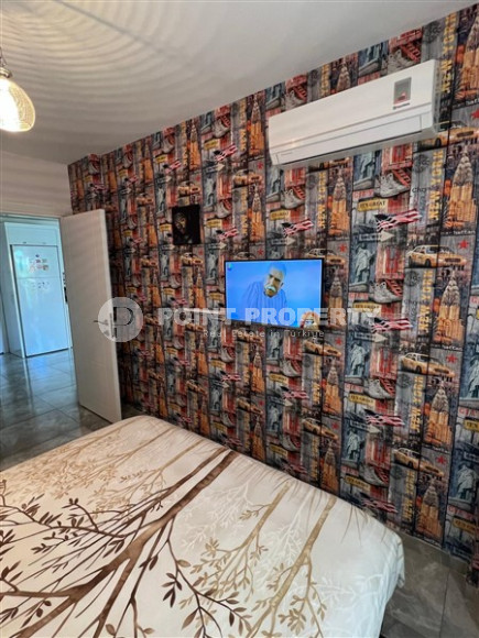 Well-maintained apartment 65 m2, 1+1, in a five-story building built in 2012 in the Oba area, Alanya-id-2686-photo-6