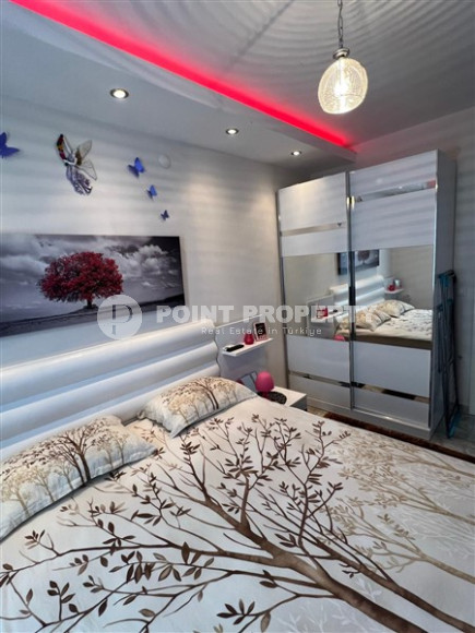 Well-maintained apartment 65 m2, 1+1, in a five-story building built in 2012 in the Oba area, Alanya-id-2686-photo-8