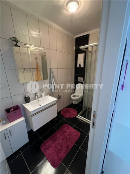 Well-maintained apartment 65 m2, 1+1, in a five-story building built in 2012 in the Oba area, Alanya-id-2686-photo-13