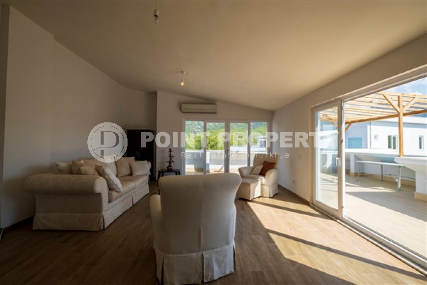 Spacious penthouse 115 m2, on the 4th and 5th floors, in a quiet area of Oba, Alanya, some distance from the sea-id-2687-photo-3