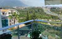 Four-room apartment with mountain views 140 m2, in the Oba area, Alanya, furnished, 2 kilometers from the sea-id-2689-photo-1