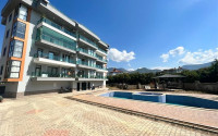 Modern three-room apartment with complete renovation, 400 meters from the sea, Oba, Alanya, 120 m2-id-2690-photo-1