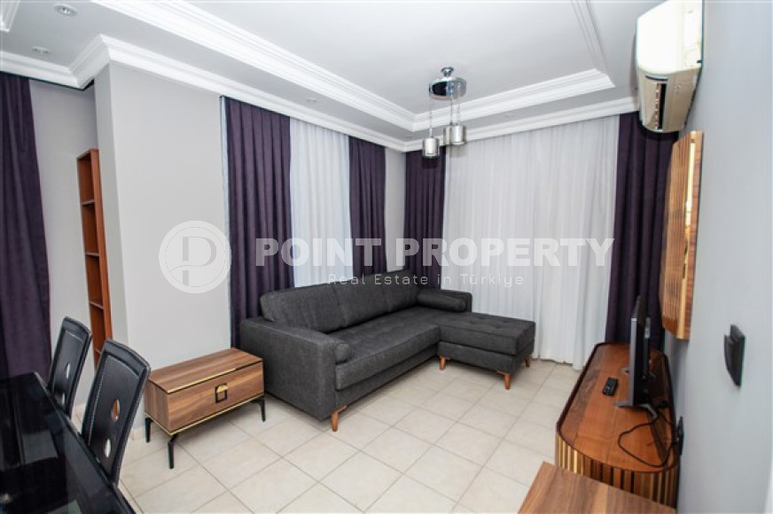 Compact and beautiful 1+1, 65 m2, on the 3rd floor of a low-rise building, 350 meters from the center of Alanya-id-2696-photo-2