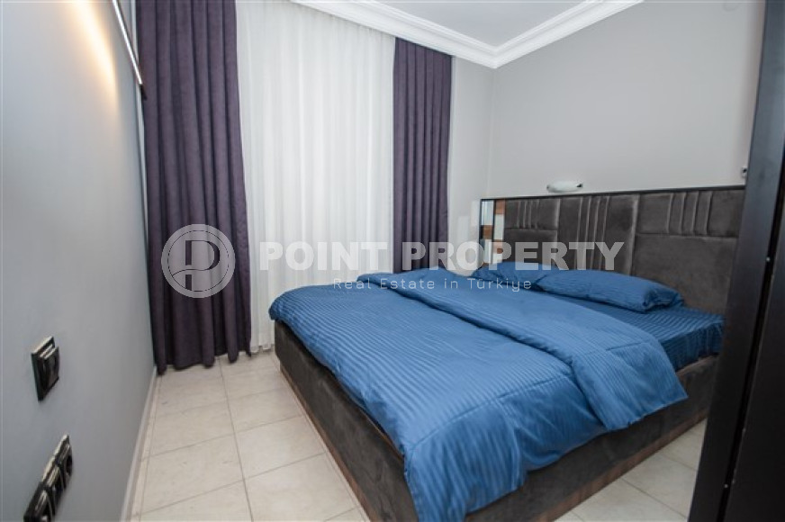 Compact and beautiful 1+1, 65 m2, on the 3rd floor of a low-rise building, 350 meters from the center of Alanya-id-2696-photo-7