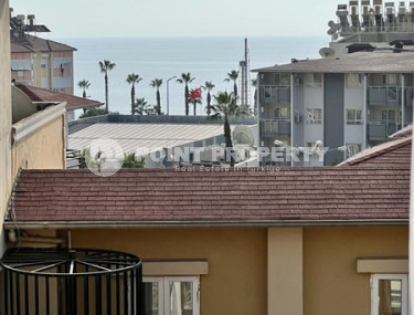 Three-room apartment 120 m2, in a house built in 2012, with sea views, in the center of Alanya-id-2698-photo-1