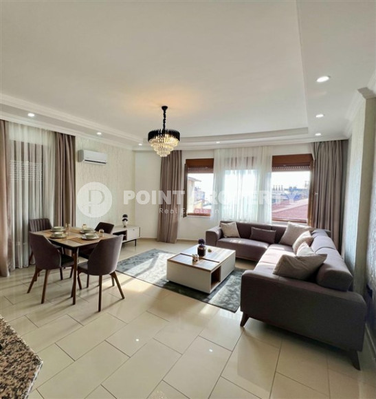 Three-room apartment 120 m2, in a house built in 2012, with sea views, in the center of Alanya-id-2698-photo-3