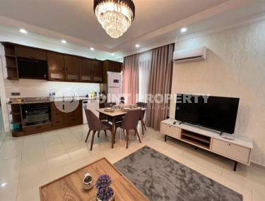 Three-room apartment 120 m2, in a house built in 2012, with sea views, in the center of Alanya-id-2698-photo-4