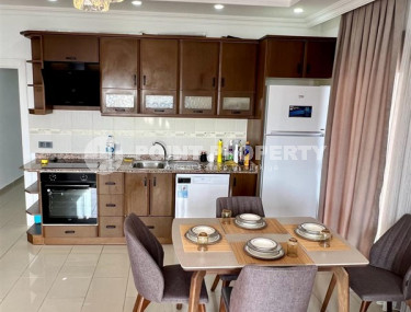 Three-room apartment 120 m2, in a house built in 2012, with sea views, in the center of Alanya-id-2698-photo-5