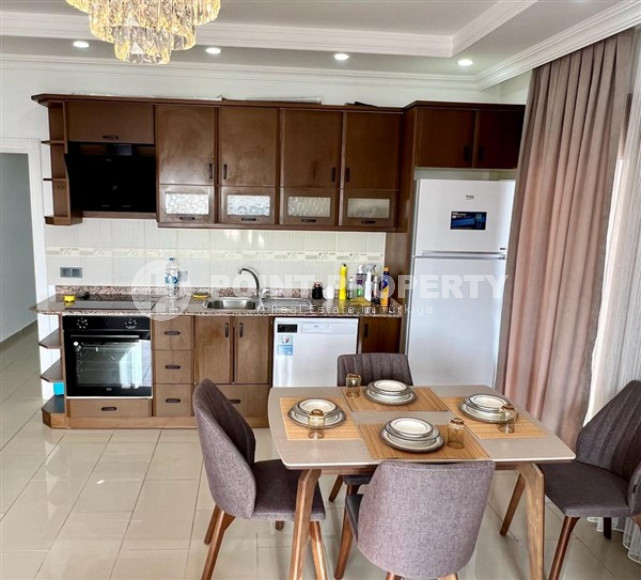 Three-room apartment 120 m2, in a house built in 2012, with sea views, in the center of Alanya-id-2698-photo-5