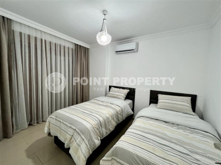 Three-room apartment 120 m2, in a house built in 2012, with sea views, in the center of Alanya-id-2698-photo-9