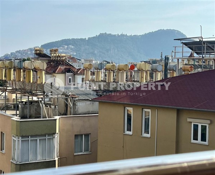 Three-room apartment 120 m2, in a house built in 2012, with sea views, in the center of Alanya-id-2698-photo-18
