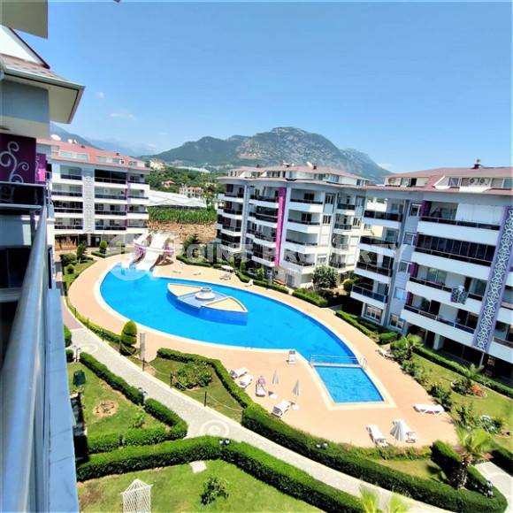 Lovely 3+1 duplex with an area of 110 m2 with fine finishing and a kitchen unit, in a low-rise complex with mountain views, Kestel, Alanya-id-2703-photo-1