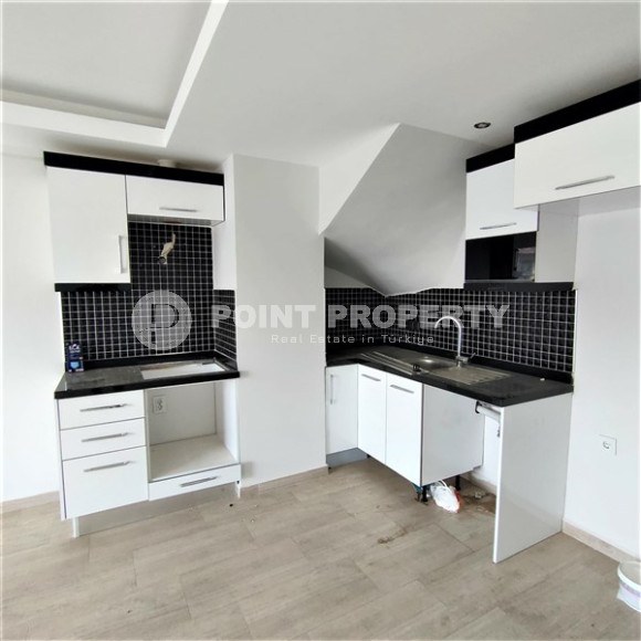 Lovely 3+1 duplex with an area of 110 m2 with fine finishing and a kitchen unit, in a low-rise complex with mountain views, Kestel, Alanya-id-2703-photo-2