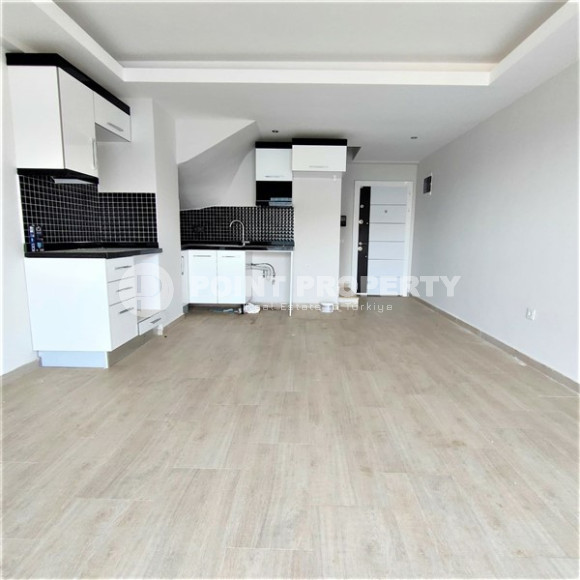 Lovely 3+1 duplex with an area of 110 m2 with fine finishing and a kitchen unit, in a low-rise complex with mountain views, Kestel, Alanya-id-2703-photo-3