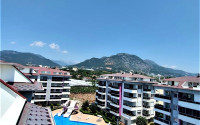 Lovely 3+1 duplex with an area of 110 m2 with fine finishing and a kitchen unit, in a low-rise complex with mountain views, Kestel, Alanya-id-2703-photo-17