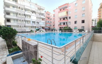 Furnished three-room apartment in Mahmutlar area, 100 m2. 400 meters to the sea.-id-1239-photo-9