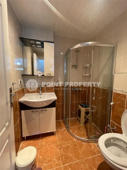 Меблированная квартира с двумя спальнями, 120м², на высоком этаже, в центре Махмутлара в 300м от моря-id-2718-фото-18