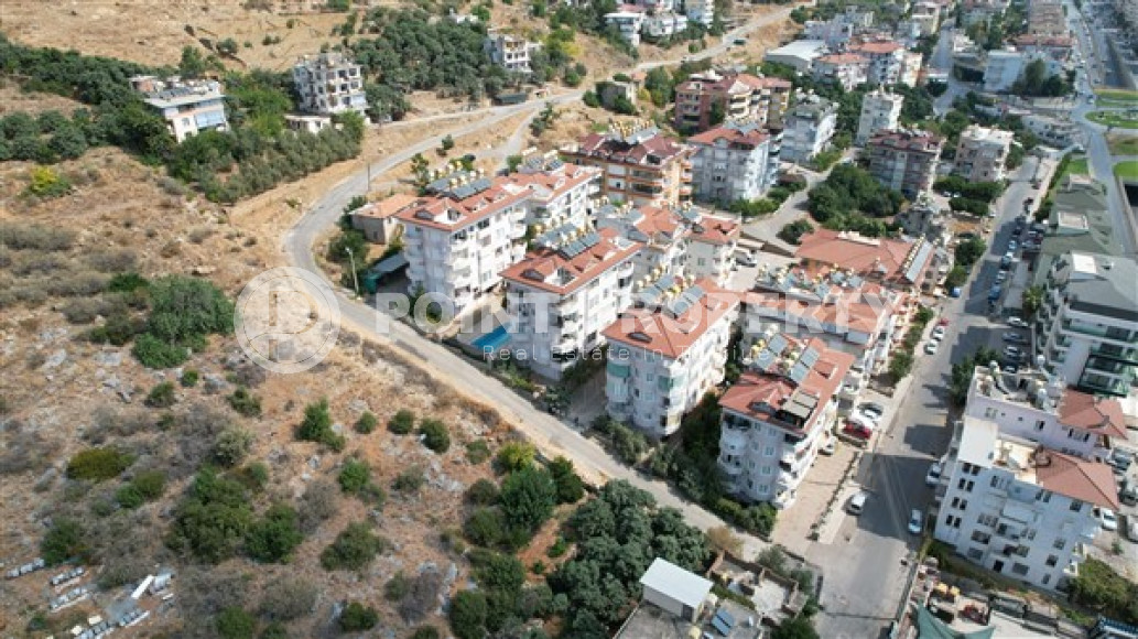 Красивая 2+1 квартира в комплексе 2009 года с бассейном, площадью 90 м2, в центре Аланьи-id-2720-фото-2