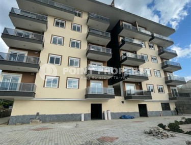 One-bedroom apartment, 65m², in a new complex 1100m from the sea in Kargicak, Alanya-id-2725-photo-1
