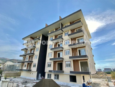 Двухкомнатная квартира, 65м², в новом комплексе в 1100м от моря в Каргыджаке, Алания-id-2725-фото-2