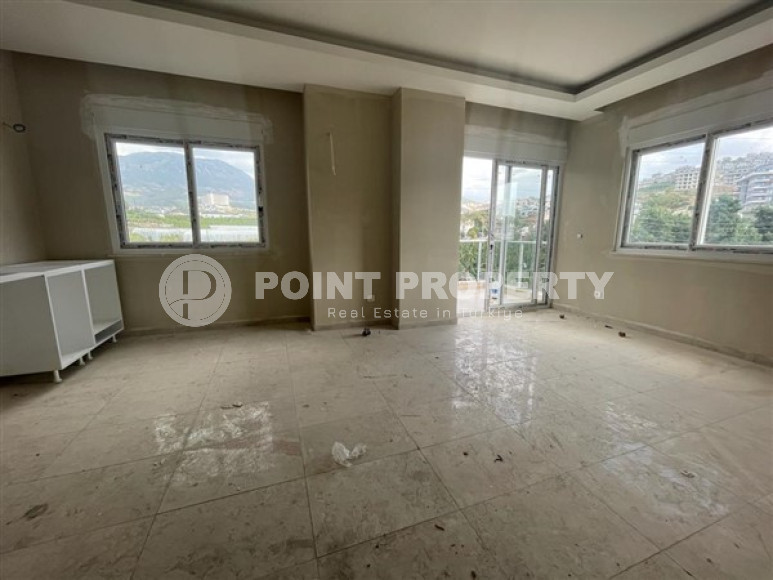 Двухкомнатная квартира, 65м², в новом комплексе в 1100м от моря в Каргыджаке, Алания-id-2725-фото-3