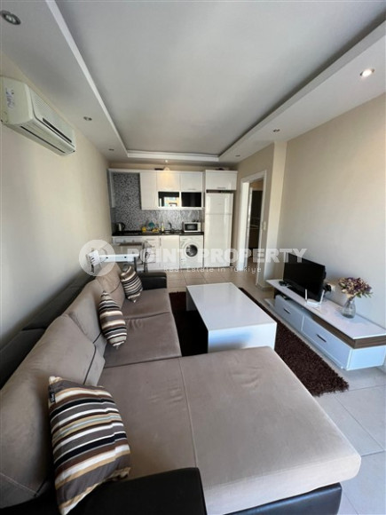 Inexpensive one-bedroom apartment, 65m², 400m from the sea in Mahmutlar, Alanya-id-2726-photo-2
