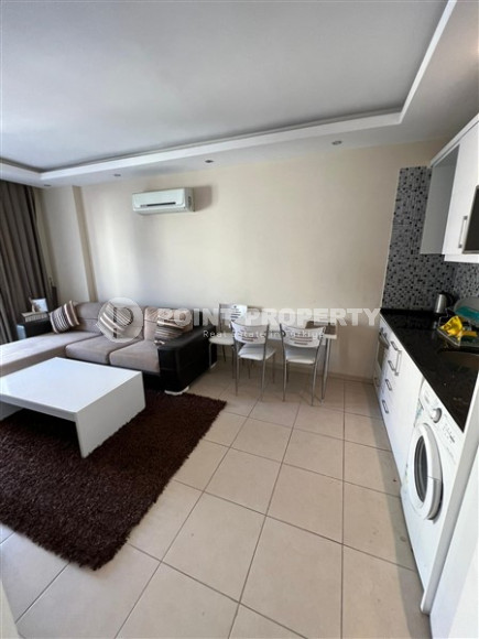 Inexpensive one-bedroom apartment, 65m², 400m from the sea in Mahmutlar, Alanya-id-2726-photo-5