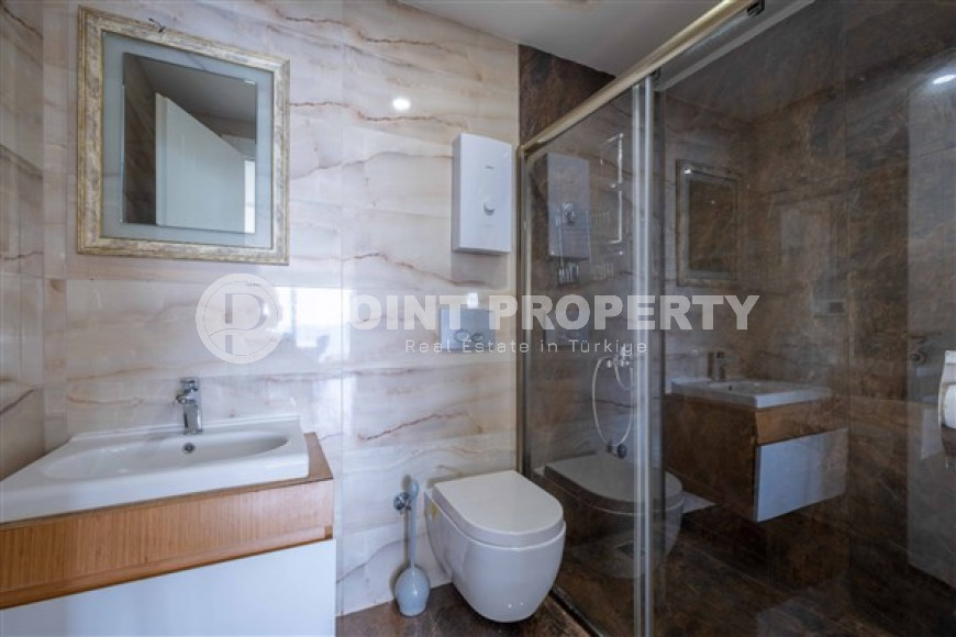 Стильная трехкомнатная квартира, 87м², с видом на море в элитном комплексе Каргыджака, Алания-id-2727-фото-17