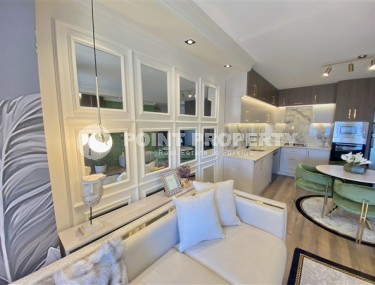 Фешенебельная двухкомнатная квартира, 65м², в 400м от моря в районе Алании Тосмур-id-2728-фото-5