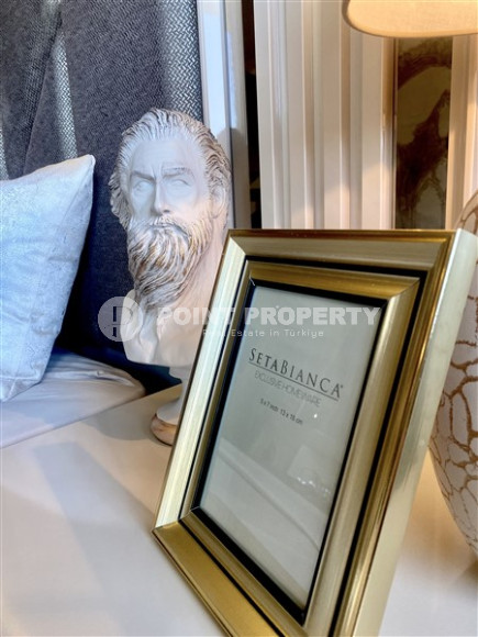 Фешенебельная двухкомнатная квартира, 65м², в 400м от моря в районе Алании Тосмур-id-2728-фото-11