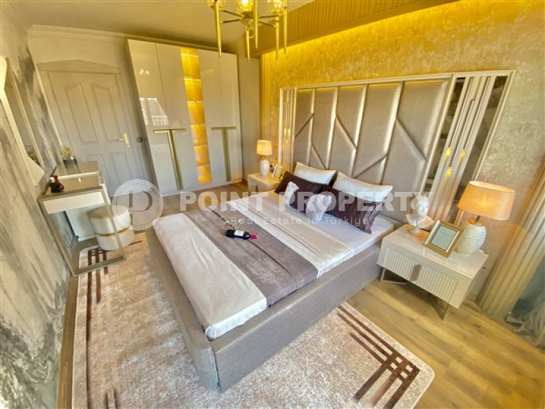 Фешенебельная двухкомнатная квартира, 65м², в 400м от моря в районе Алании Тосмур-id-2728-фото-13