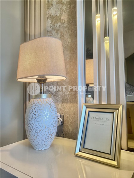 Фешенебельная двухкомнатная квартира, 65м², в 400м от моря в районе Алании Тосмур-id-2728-фото-16