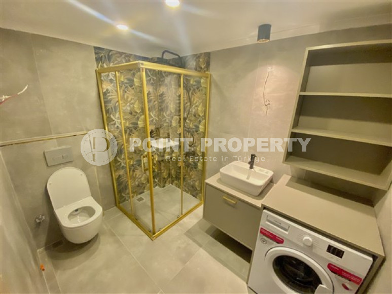 Фешенебельная двухкомнатная квартира, 65м², в 400м от моря в районе Алании Тосмур-id-2728-фото-18