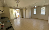 Three-room apartment, 105m² in a residence with a swimming pool in the center of Alanya-id-2736-photo-1