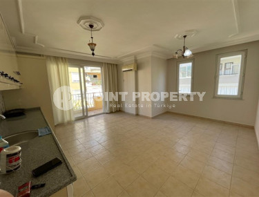 Three-room apartment, 105m² in a residence with a swimming pool in the center of Alanya-id-2736-photo-1