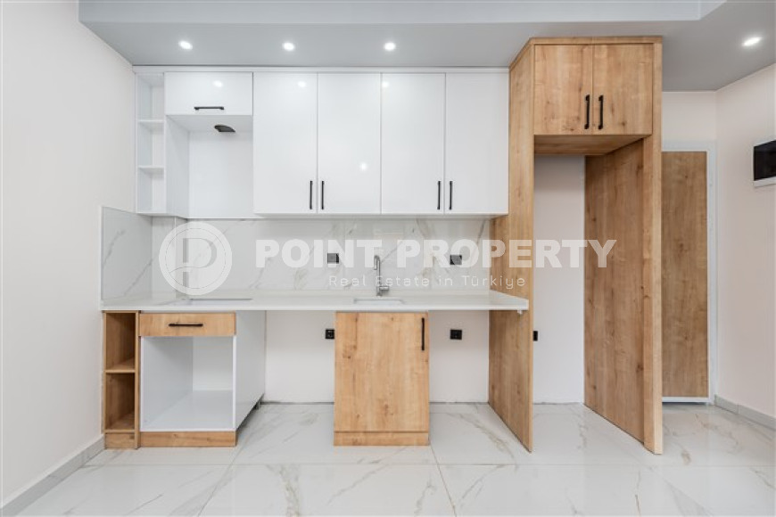 Двухкомнатная квартира, 50м², с чистовой отделкой в новом комплексе в районе Авсаллар, Алания-id-2738-фото-3