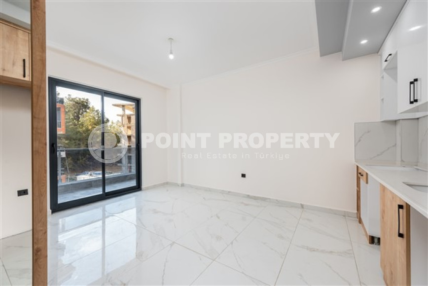 Двухкомнатная квартира, 50м², с чистовой отделкой в новом комплексе в районе Авсаллар, Алания-id-2738-фото-4